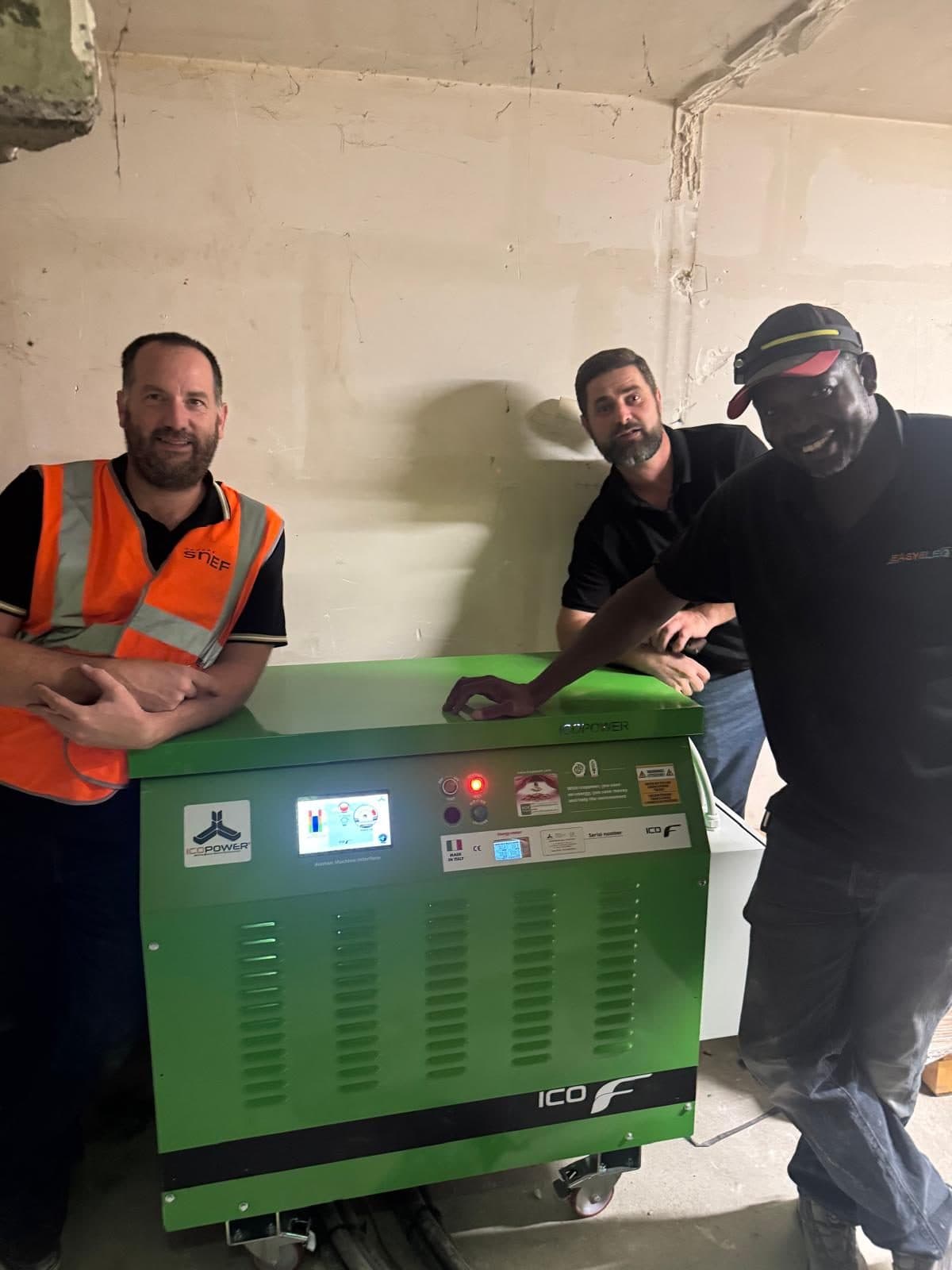 Installation team with a commissioned Icopower unit